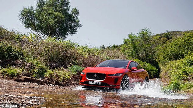 Electric cars: The Jaguar I-Pace (pictured) drives through water, proving that electric vehicles can be just as good, if not better, at driving through water.