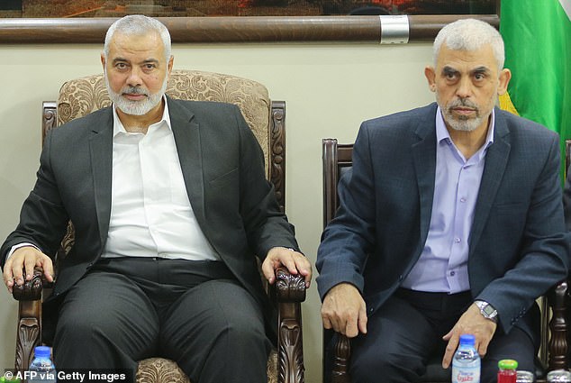 In July, the leader of Hamas's political wing, Ismail Haniyeh, was blown up while visiting Tehran to attend the inauguration of the Iranian president. Pictured with Sinwar in 2019