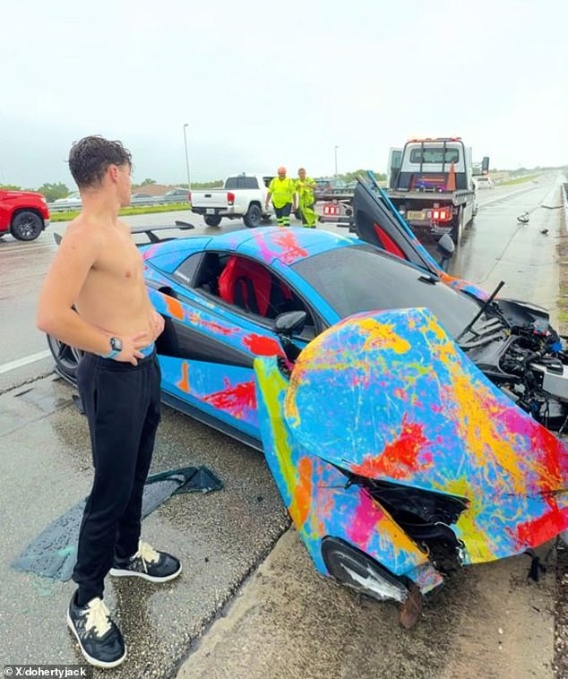 Doherty is seen next to his McLaren after the accident.