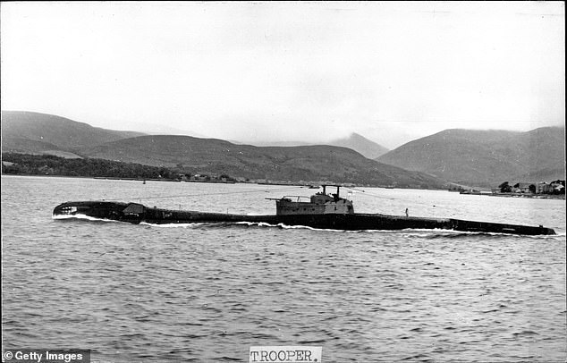 File image showing the Royal Navy submarine HMS Trooper at sea, undated