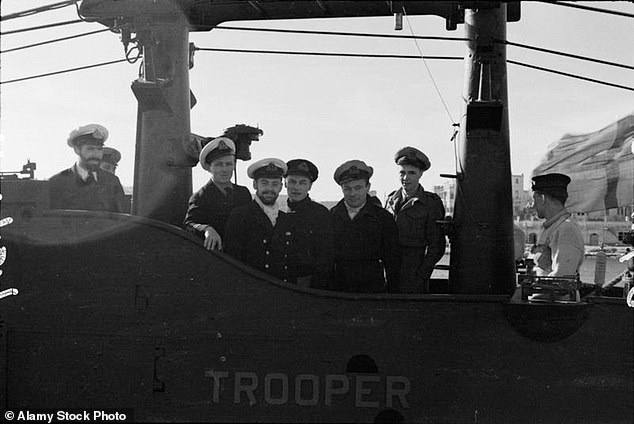 Submarines aboard HMS Trooper in an image from February 4, 1943.