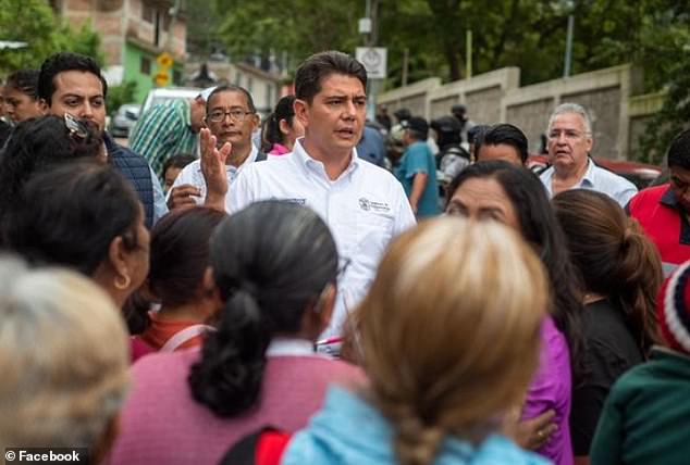 Hours before he was killed on Sunday, Mayor Alejandro Arcos visited Chilpancingo neighborhoods affected by Hurricane John last month.