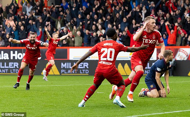 Ante Palaversa's late goal against Hearts kept the Dons top with Celtic