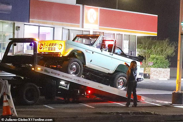 Eventually, the car was loaded onto the back of a flatbed tow truck and taken to a Circle K gas station.