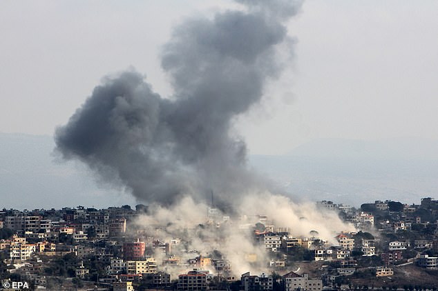 Smoke rises after an Israeli airstrike on the village of Khiam, seen from Marjaayoun, near the border with Israel in southern Lebanon.