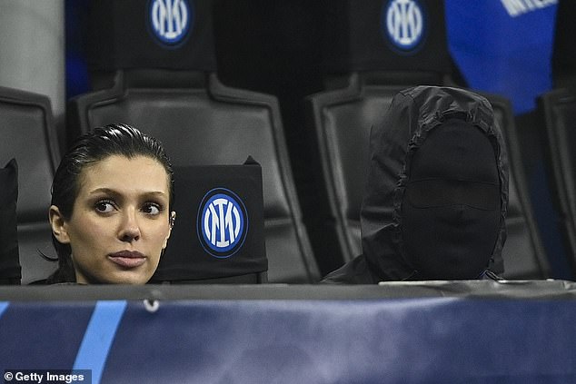 West donned a balaclava while sitting with Censori at a UEFA event in Milan, Italy, in February 2024.