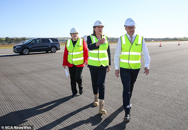 Transport Minister Catherine King (pictured with Anthony Albanese) says she is not ruling out the government buying a stake in Rex Airlines, after the airline collapsed in August.