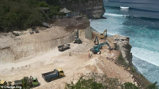 Bulldozers are building a service wall and sea wall at the base of the Uluwatu cliffs, alarming conservationists.