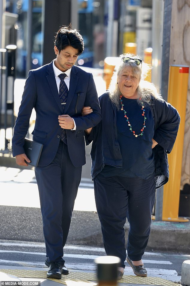 After collecting her luggage and being taken to the front of the airport, staff assisted Noni as she walked to the arrivals area and waited for a driver.