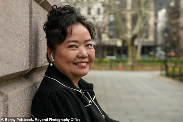 Winnie Greco, 61, the city's Asian affairs director, also left Monday amid accusations that she promised a job to a campaign volunteer in exchange for renovating her kitchen.