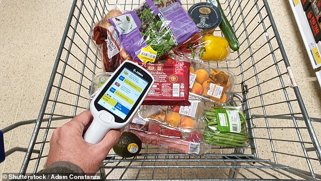 If you use the auto-scan machines at your local stores, you've probably noticed that where you put the tool on the cart is different now. Instead of the slot for barcode readers appearing on the right side of the cart, they are located on the left (file photo)