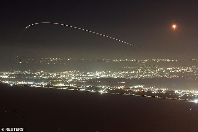 Israel's Iron Dome anti-missile system operates to intercept rockets launched from Lebanon towards Israel, amid hostilities between Hezbollah and Israel, as seen from Haifa, Israel.