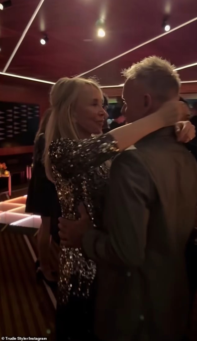 The couple, married since 1992, kissed on the dance floor as they partied the night away.