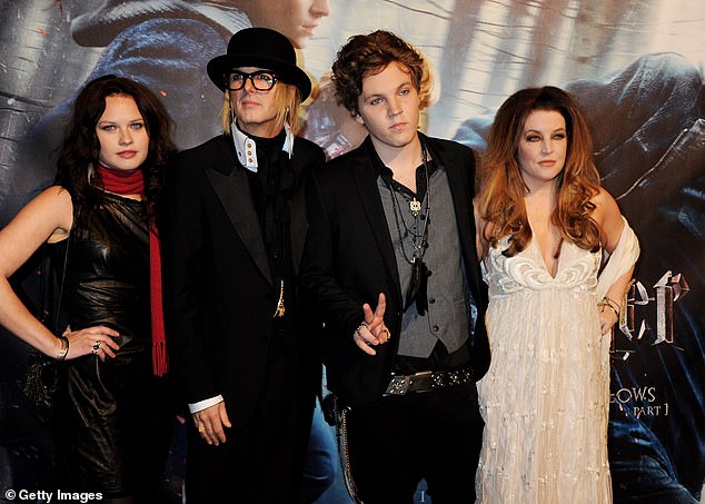 Michael Lockwood (CL), Ben Keough (CR) and Lisa Marie Presley (R) attend the world premiere of Harry Potter and the Deathly Hallows in London, November 11, 2010.