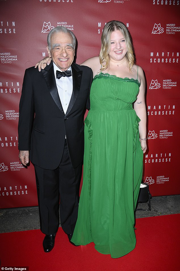 Francesca looks incredible in a long flowy green dress as she hugs her father.