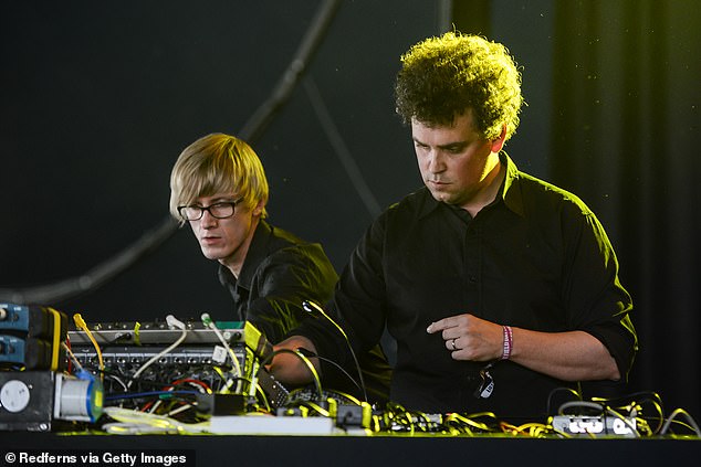 Jas Shaw and James Ford of DJ/Producer duo Simian Mobile Disco perform on stage at Field Day Festival 2014