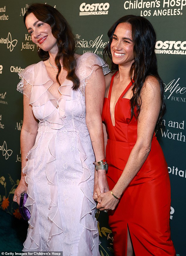 Holding hands with her friend Kelly McKee Zajfen at the event, Meghan looked like a washed-up celebrity rather than the strong, principled woman Liz Jones has always admired.