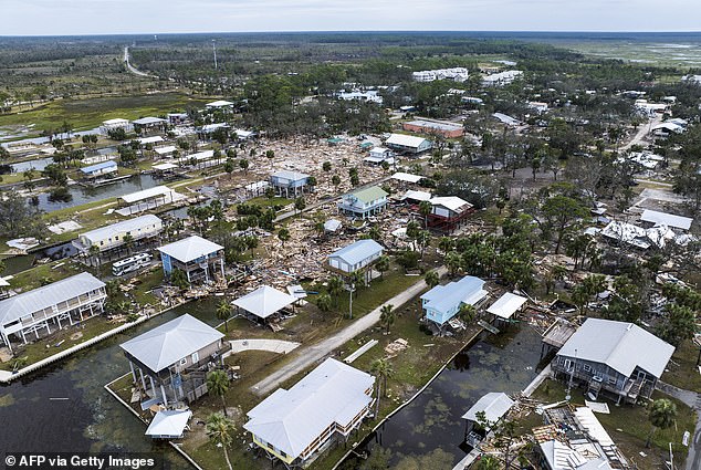 Hurricane Helene, expected to cause more than $15 billion in property damage, is sure to send premiums skyrocketing (pictured: An aerial view of damage after Helene in Horseshoe Beach, Florida)