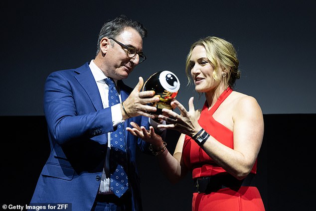 Kate was all smiles as she took to the stage to receive her award and gave a speech to the crowd.