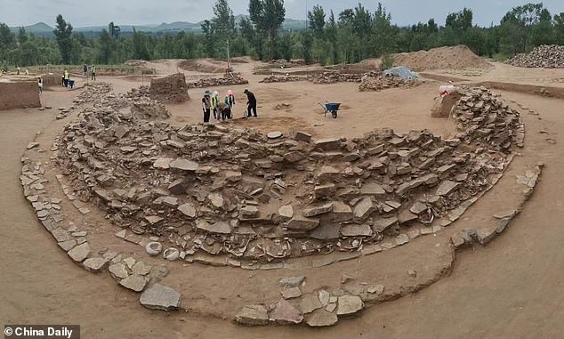 The relics were found beneath a circular tomb at the Yuanbaoshan burial site.