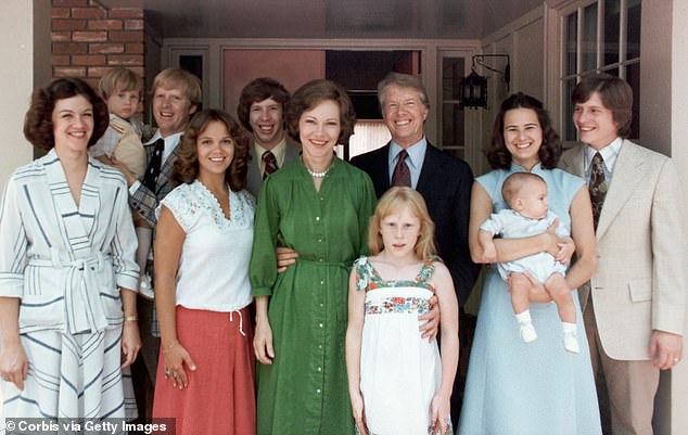 Jimmy Carter's youngest son, Jeff (behind left of Rosalynn), has been living quietly with Parkinson's disease.