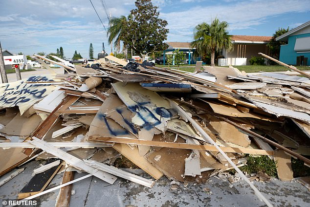 More than 12,000 cubic yards of debris have been removed in areas of Florida affected by Helene in less than two days, officials said.