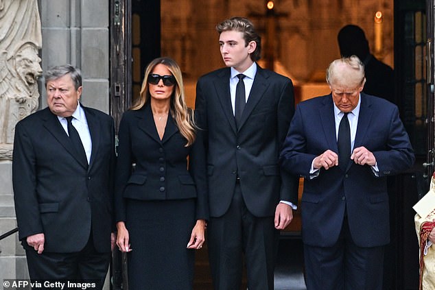 Melania Trump (center left) is photographed with her father Victor Knavs (left), son Barron (center right) and former President Donald Trump at her mother's funeral in January earlier this year.