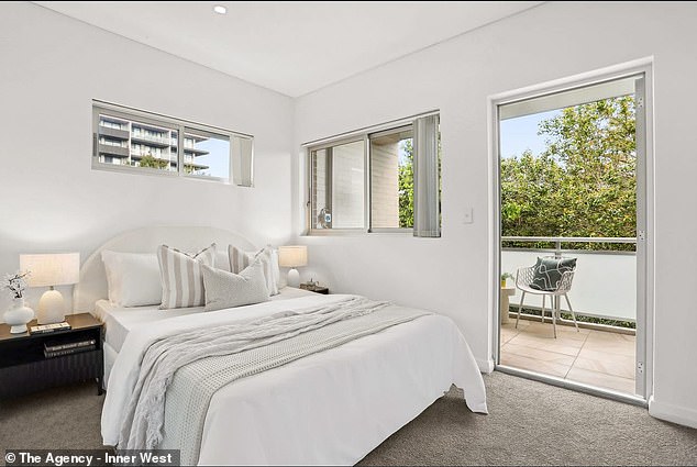 The two-storey semi-detached house has three bedrooms (one pictured) plus a study and two balconies.