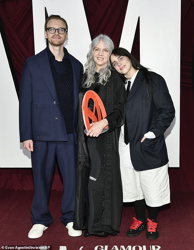 The actress, 65, arrived at the event with her two Grammy-winning musician sons on her arm and walked the red carpet with them at the Times Square EDITION hotel in New York City.