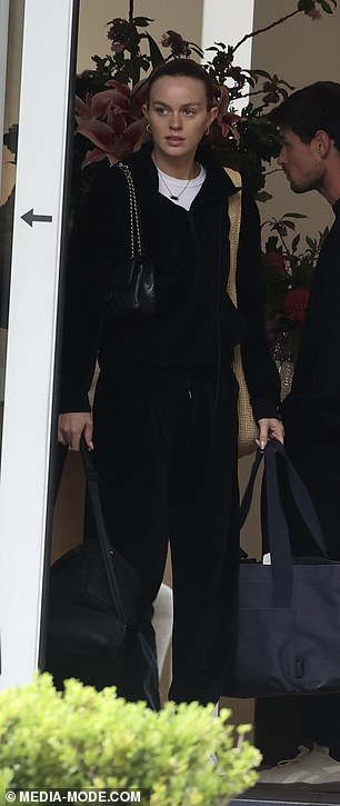 The couple dressed in black for the flight on a private jet that transported the trendy family from Queenstown to Sydney.