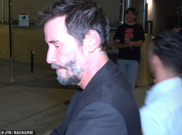 Meanwhile, the actor sported a black jacket and a scruffy beard.