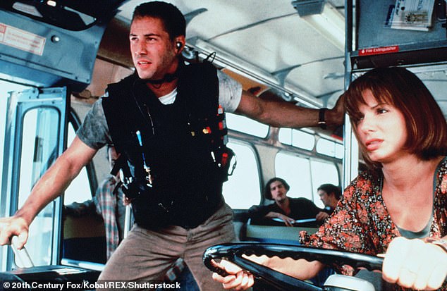 Reeves and Bullock's characters find themselves in a race against time to prevent tragedy from occurring; seen in a frame