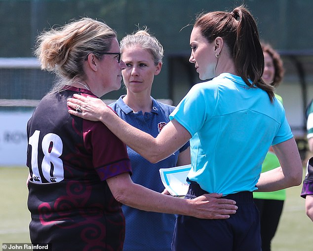 Kate is pictured when she met Issy's mother Sarah Renton in May last year and was given the earrings.