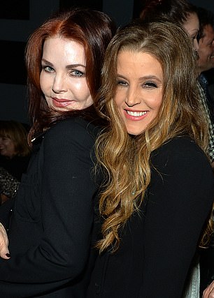 Priscilla Presley celebrates backstage with her daughter Lisa Marie Presley after Lisa Marie's performance at 3rd & Lindsley during the 14th Annual American Music Festival and Conference in 2013.