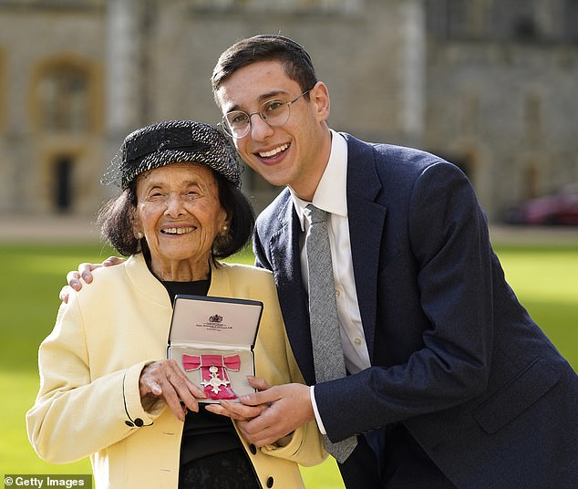 Lily (pictured) was recognized for her services to Holocaust education at Windsor Castle last year after being included in the New Year's Honors list, the first overseen by King Charles since his accession to the throne . Pictured with his great-grandson Dov Forman