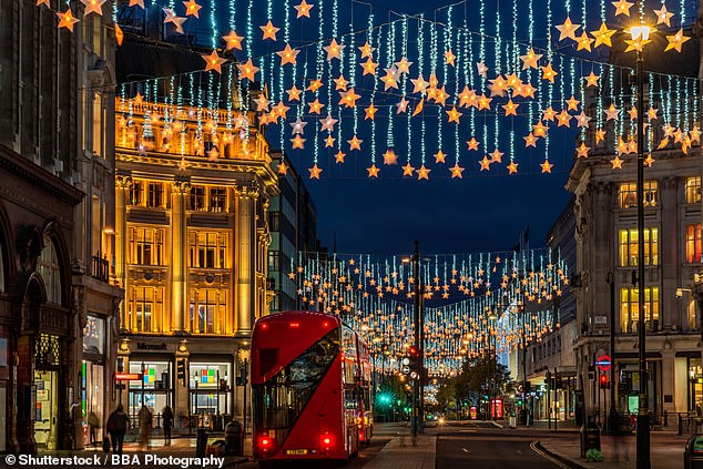 Visitors enjoy seeing the dazzling Christmas lights on Oxford Street (above) – the activity is trending on TikTok with 41,200 tagged posts.