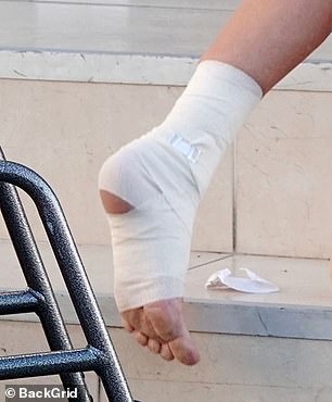 His foot and ankle were bandaged.