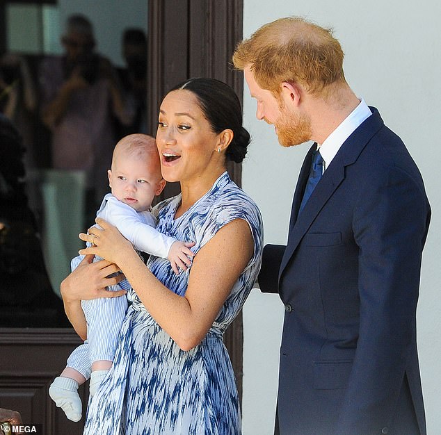 Prince Harry and Meghan pictured with Archie