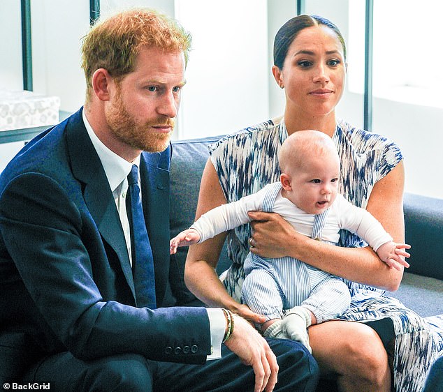 The couple photographed with Archie, their first-born.