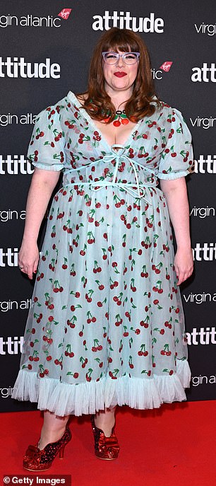 Chase star Jenny Ryan looked stunning in a deep blue cherry-print dress with a ruffled mesh hem.