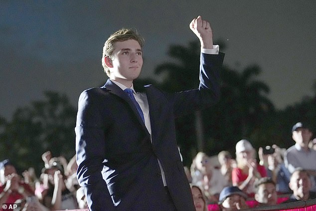 Barron Trump gestures as his father, former Republican President Donald Trump, speaks at a campaign rally at Trump National Doral Miami, Tuesday, July 9, 2024, in Doral, Florida. Shulz joked about Barron's private life now that he's a student at NYU