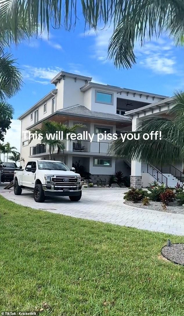 The woman then headed to her huge house, equipped with a large stone driveway filled with pickup trucks and construction workers helping her family prepare for the storm.