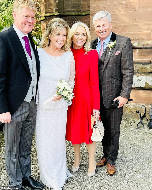 The couple were all smiles as they posed for photos outside the church.