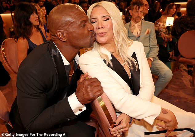 The couple (pictured at the 2024 Grammy Awards) are now business partners in their Rebecca Crews clothing line.