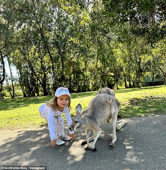 Chris and Shannan flew from Florida to Australia in 2021 to meet their granddaughter Grace (pictured) for the first time.