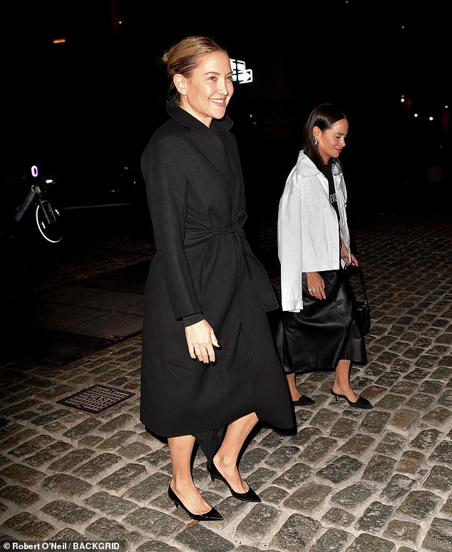 Hudson, daughter of Goldie Hawn, looked effortlessly chic in a black dress and peacoat, perfect for the cold fall night.