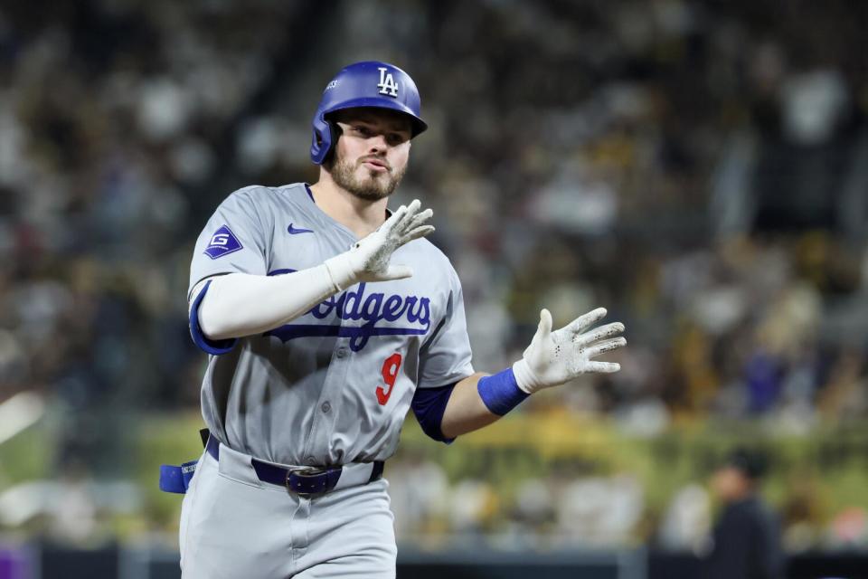 Dodger Gavin Lux celebrates after hitting a two-run home run during the seventh inning of Game 4 of the NLDS.