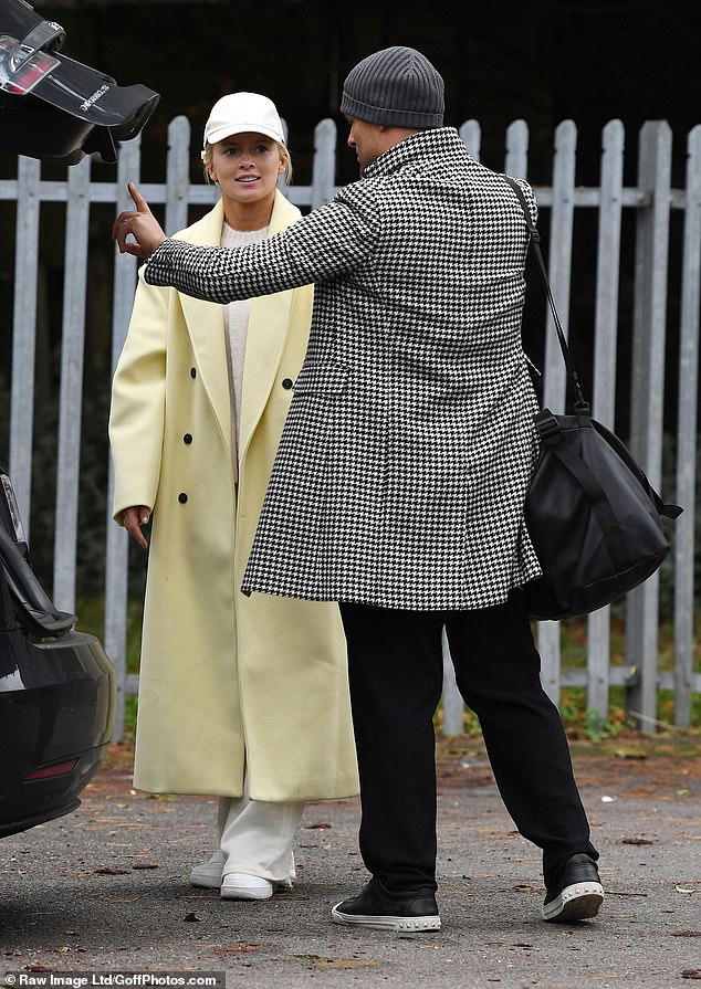 Tasha put on a brilliant show in an oversized pale yellow coat, a pair of cream joggers and a knit sweater.