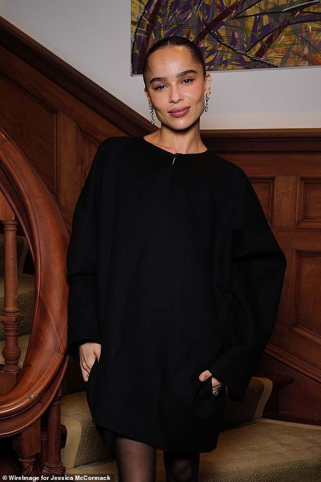 The actress, 35, wore an elegant black minidress with an oversized finish and bell sleeves to celebrate.