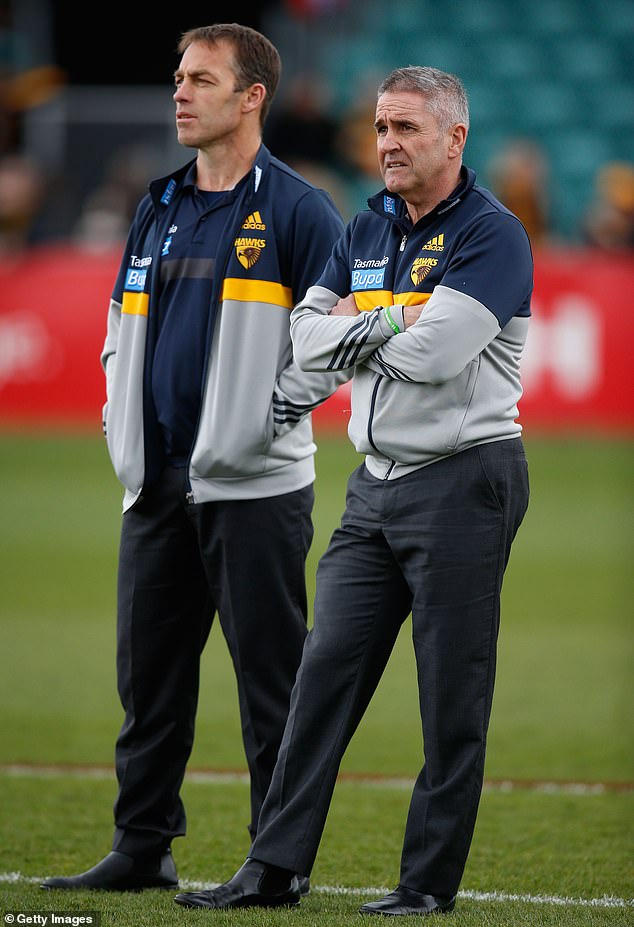 Former Hawks head coach Alastair Clarkson (left) and his former assistant Chris Fagan (pictured together in 2015) have denied any wrongdoing over explosive racism allegations.